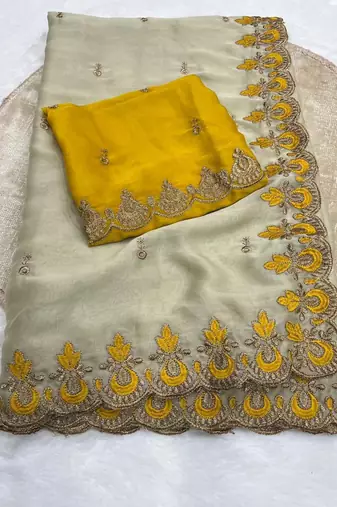 beige silk wedding saree with embroidery and zari work