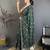 green vichitra silk animal motifs foil print sequin & zari embroidery work bandhani saree