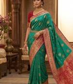 Red rama banarasi silk saree with blouse piece.