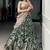 Wonderful Green Kalamkari Printed Silk Mehendi Wear Half Saree Lehenga
