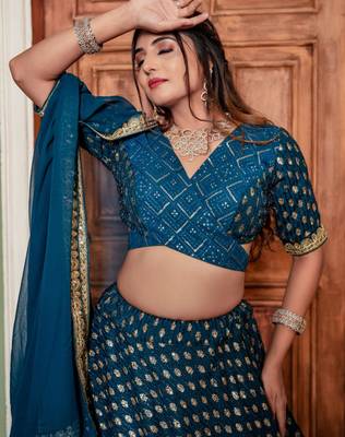 teal georgette lehenga with embroidered border design
 2