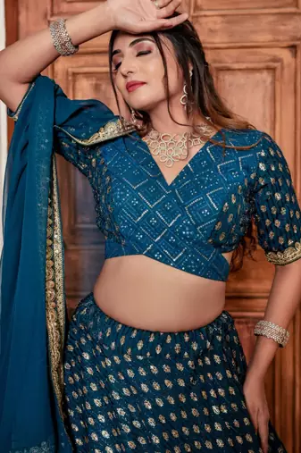 teal georgette lehenga with embroidered border design
