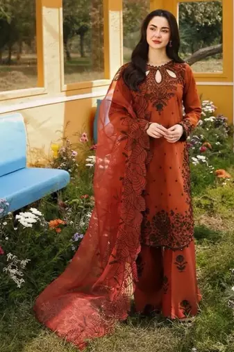 dark orange rayon salwar kameez with floral embroidery