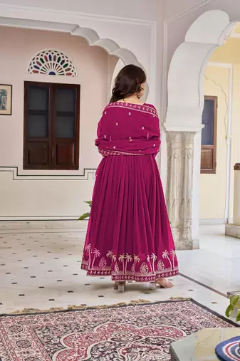 rani pink faux georgette anarkali gown set with zari motifs