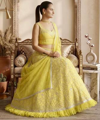 light yellow georgette lehenga with mirror work
 2