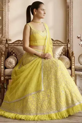light yellow georgette lehenga with mirror work