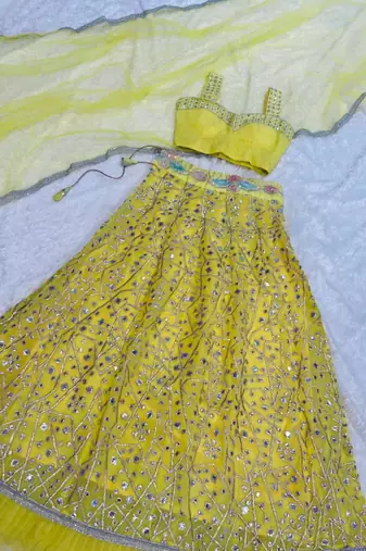 light yellow georgette lehenga with mirror work