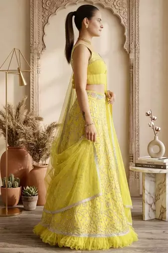 light yellow georgette lehenga with mirror work