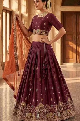 maroon silk blend lehenga set with elephant motifs