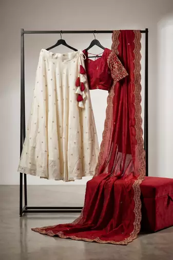 cream silk blend lehenga set with gold butti work