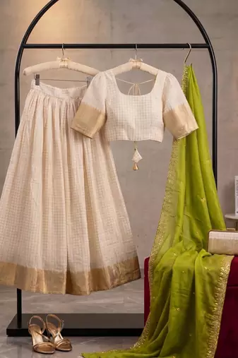 cream silk blend lehenga set with zari border
