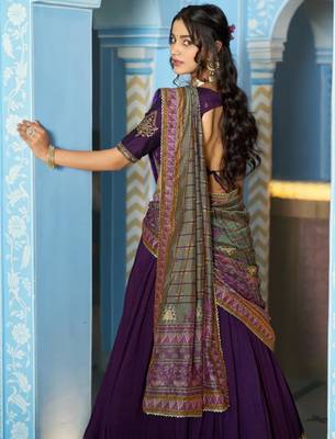 purple silk blend lehenga with gold embroidery work
 2