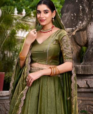 olive silk blend lehenga with gold embroidery work
 3