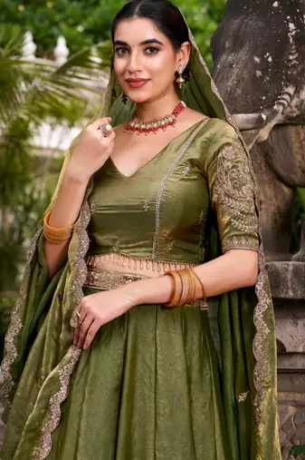 olive silk blend lehenga with gold embroidery work