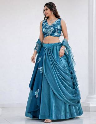 teal silk blend lehenga set with layered tier design
 3