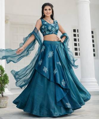teal silk blend lehenga set with layered tier design
 4