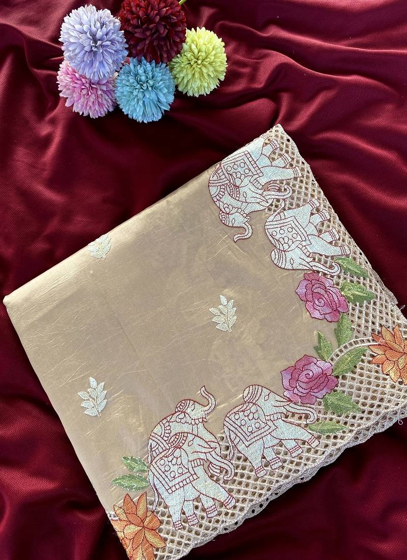 Beige Color embrodied elephant design panel with cutwork and hole work Silk Saree