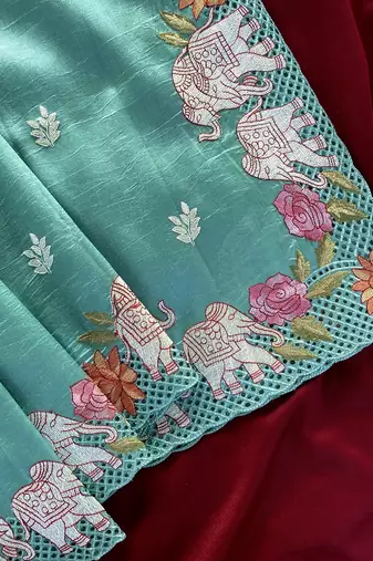 Blue Color embrodied elephant design panel with cutwork and hole work art silk saree
