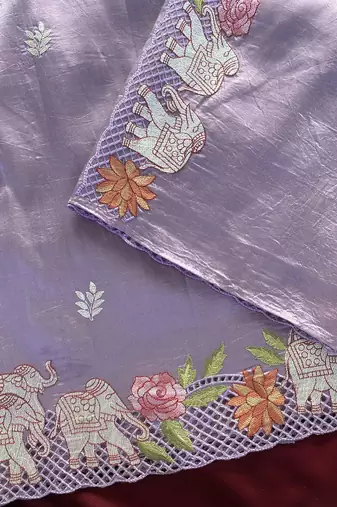 Purple Color embrodied elephant design panel with cutwork and hole work art silk saree