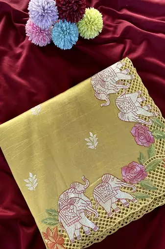 Yellow Color embrodied elephant design panel with cutwork and hole work Silk Saree