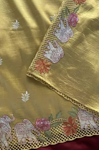 Yellow Color embrodied elephant design panel with cutwork and hole work art silk saree