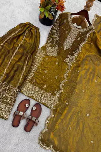 gold silk salwar kameez set with embroidered sequins