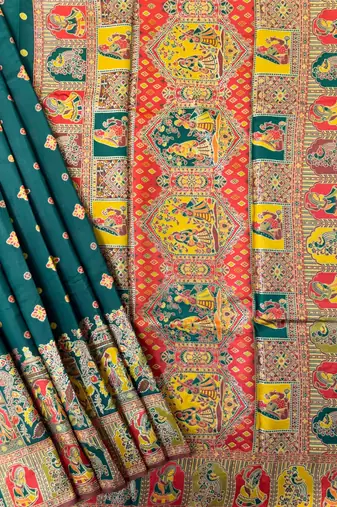dark green banarasi silk saree with butti design