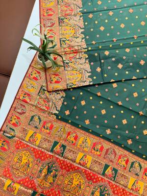 dark green banarasi silk saree with butti design
 3