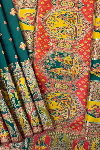 dark green banarasi silk saree with butti design