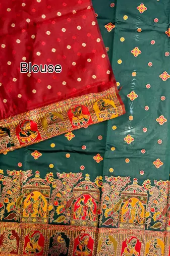 dark green banarasi silk saree with butti design