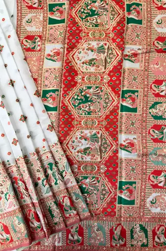 white silk blend saree with meena border weaving