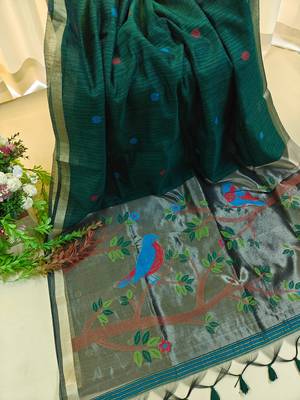 dark green silk blend saree with zari weaving
 2