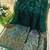 Dark green color pure zari and meena weaving linen silk saree