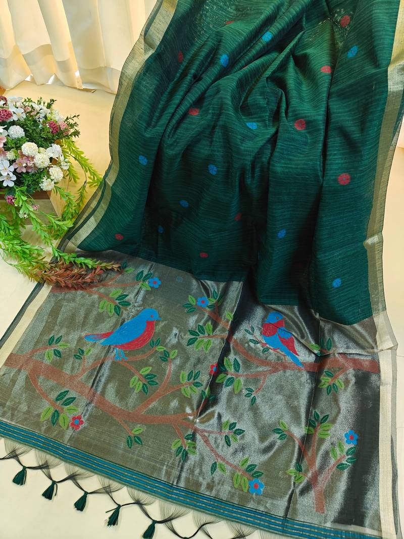 Dark green color pure zari and meena weaving linen silk saree