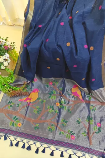Navy blue color pure zari and meena weaving linen silk saree