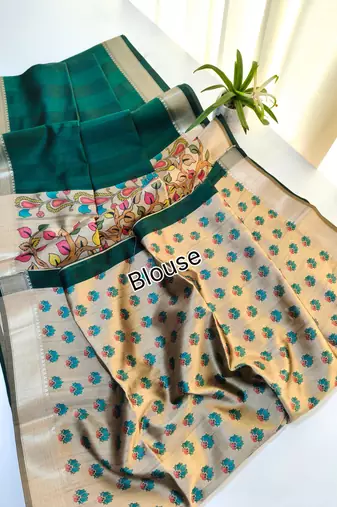 dark green khadi silk saree with zari woven border