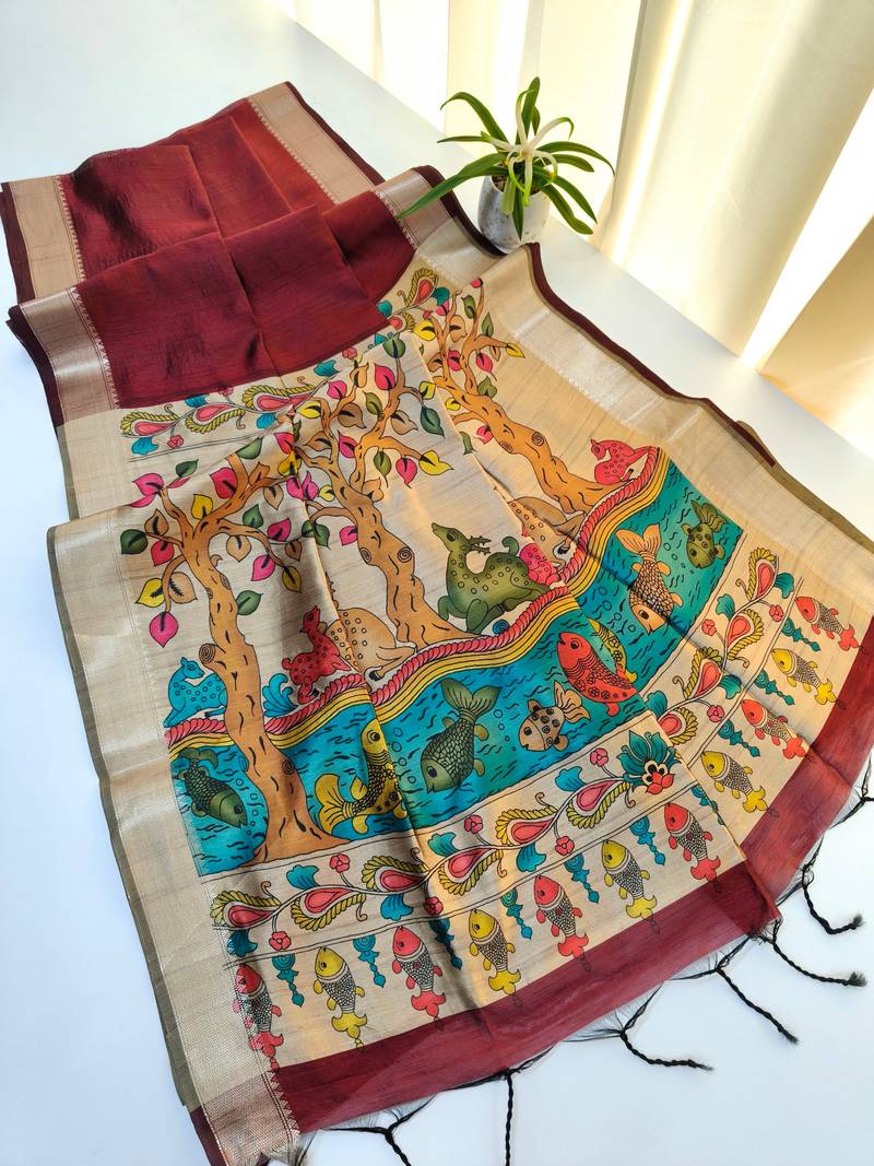 Maroon color hiran and fish and zari weaving border with classic weaving khadi raw silk saree