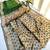 Parrot green  color hiran and fish and zari weaving border with classic weaving khadi raw silk saree