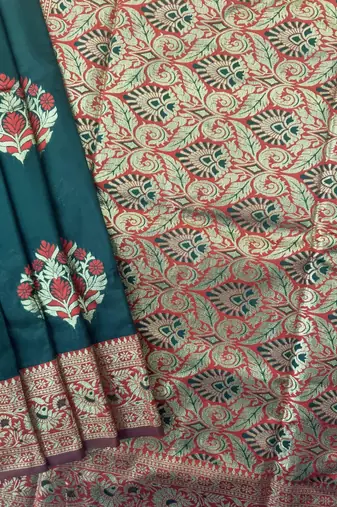 dark green banarasi silk saree with designer woven pallu