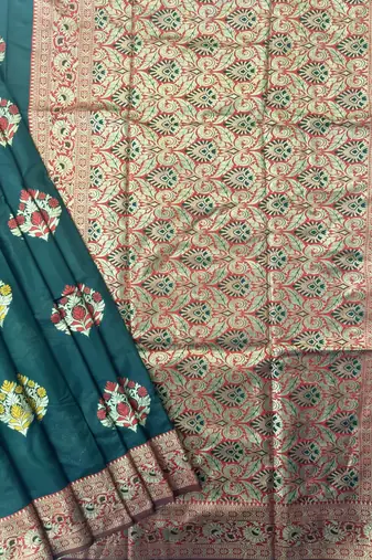 dark green banarasi silk saree with designer woven pallu