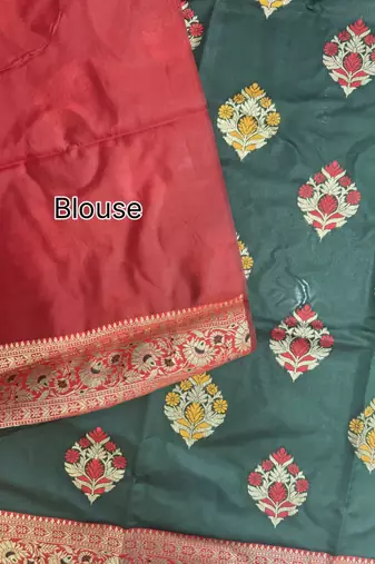 dark green banarasi silk saree with designer woven pallu