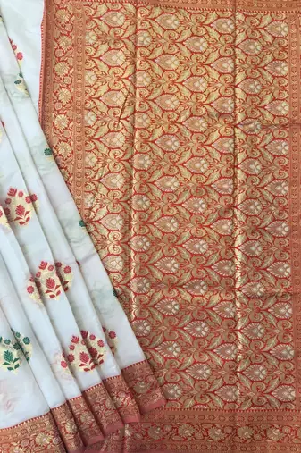 white banarasi silk saree with contrast zari buttis