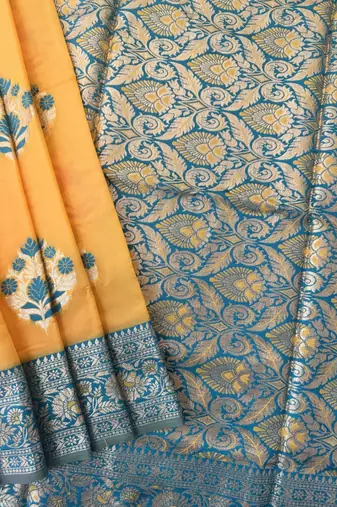 yellow banarasi silk saree with zari woven border