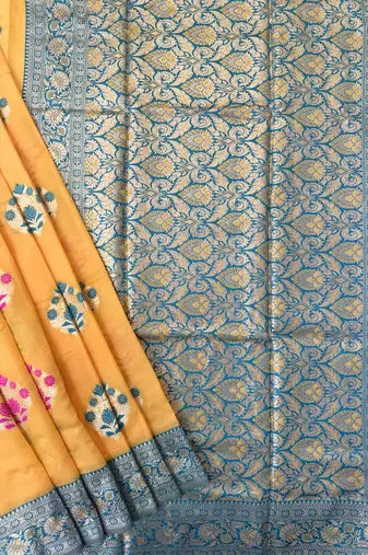 yellow banarasi silk saree with zari woven border