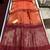Light orange color bandhni style butti weaves khadi raw silk saree