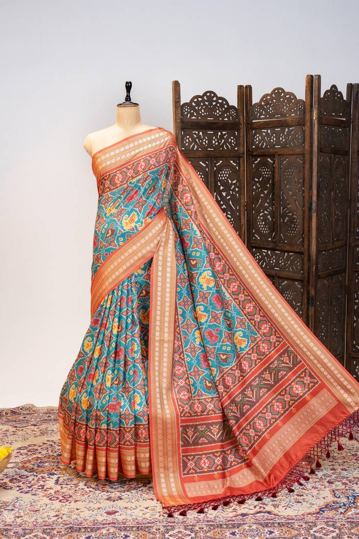 Blue color patola design and silver coin weaving pure patola silk saree