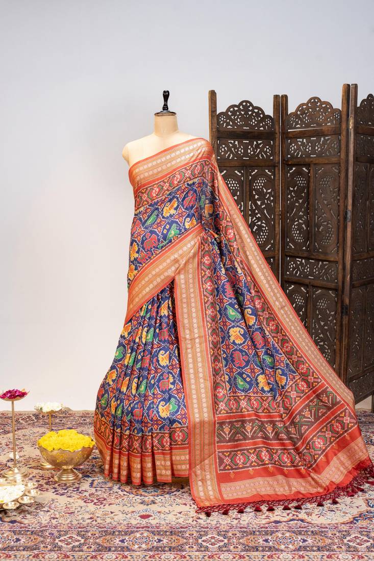 Navy blue color patola design and silver coin weaving pure patola silk saree
