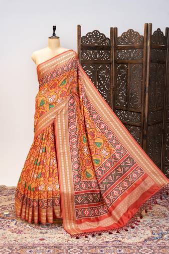 Orange color patola design and silver coin weaving pure patola silk saree