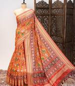 Orange color patola design and silver coin weaving pure patola silk saree