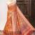 Orange color patola design and silver coin weaving pure patola silk saree